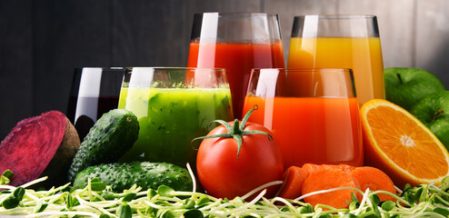 Glasses with fresh organic vegetable and fruit juices
