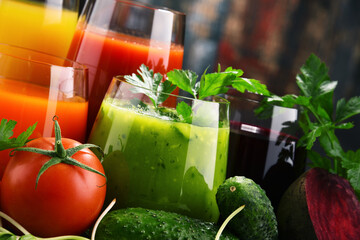 Glasses with fresh organic vegetable and fruit juices