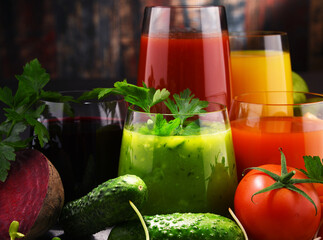 Glasses with fresh organic vegetable and fruit juices