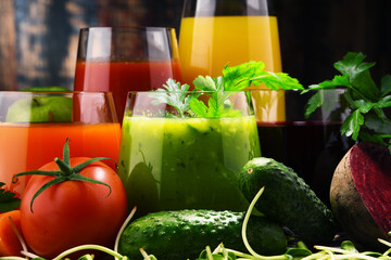 Glasses with fresh organic vegetable and fruit juices