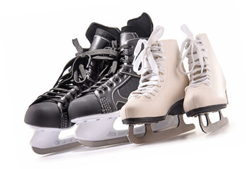 Ice hockey skates and figure skates isolated on white