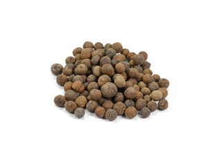 Allspice, pimento spice, Jamaican pepper pile isolated on white background