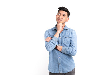 Latino man in pensive pose on white background