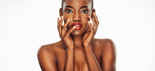 Beautiful black woman . Beauty portrait of african american woman with clean healthy skin on beige...