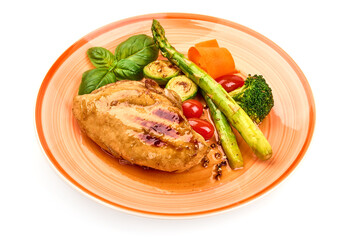 Grilled chicken breast with vegetables. Healthy food, isolated on white background. High resolution image