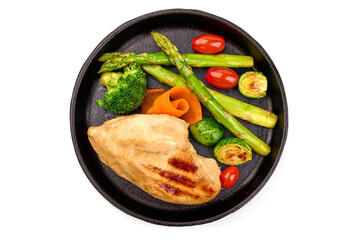 Roasted chicken breast with vegetables. Healthy food, isolated on white background. High resolution image