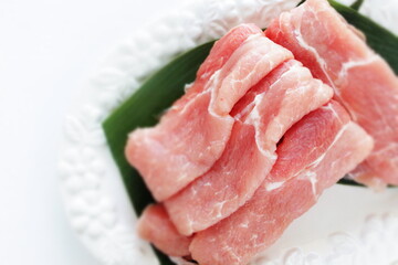 freshness pork slices on leaf for prepared ingredient
