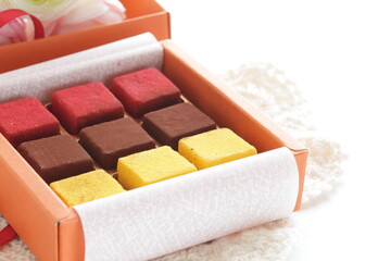 Multiple color and favor chocolate in gift box for holiday image