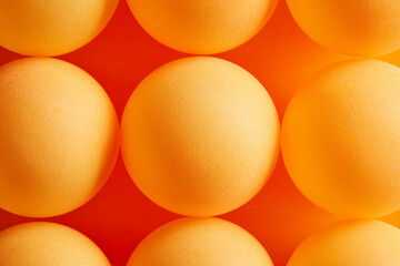 Orange table tennis or ping pong lottery balls.