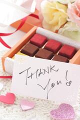 Multiple color and favor chocolate in gift box for holiday image