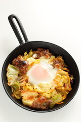 Korean food, cabbage and pork stir fried with egg