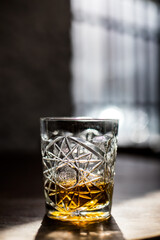 Whisky glass on a wooden surface