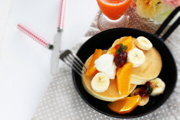 homemade banana and orange pan cake for breakfast