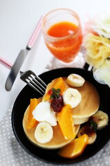 homemade banana and orange pan cake for breakfast
