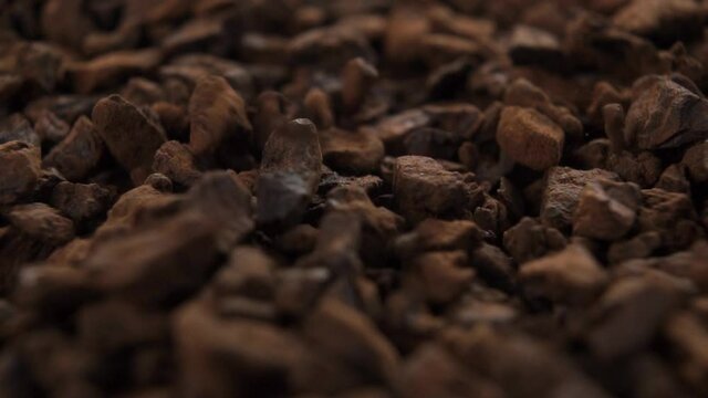 Chicory close-up. Natural sublimated instant chicorium root. Falling into a heap in slow motion
