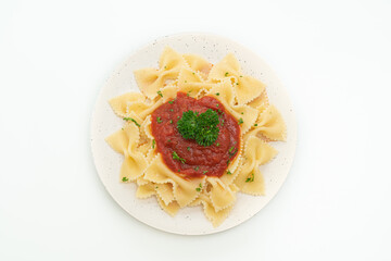 farfalle pasta in tomato sauce with parsley