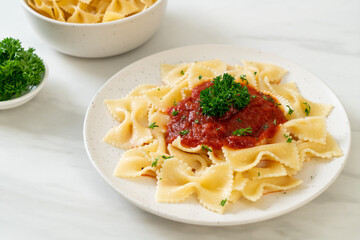 farfalle pasta in tomato sauce with parsley