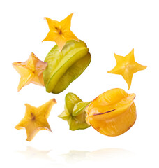 Fototapeta premium Creative image with fresh yellow carambola falling in the air