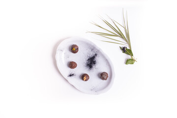 top view of tasty pralines with minimalist decoration