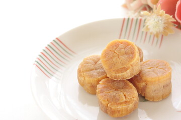 Chinese gourmet food ingredient, dried scallop on plate with copy space 