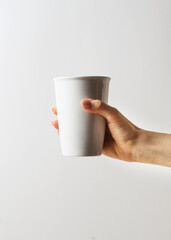 Mug or cup of coffe to go porcelain on white background