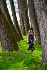 Young woman walking in the park