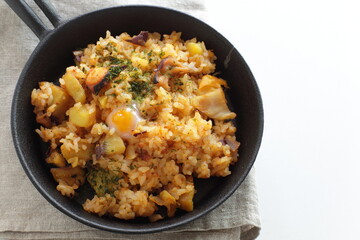 Korean food, spicy octopus fried rice in skillet pan