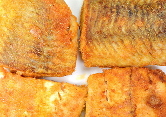 Fried codfish isolated on white background.