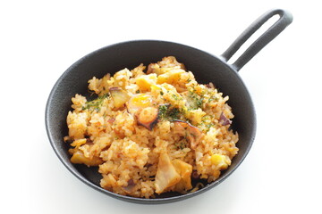 Korean food, spicy octopus fried rice in skillet pan