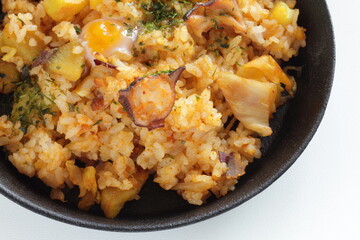 Korean food, spicy octopus fried rice in skillet pan