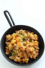 Korean food, spicy octopus fried rice in skillet pan