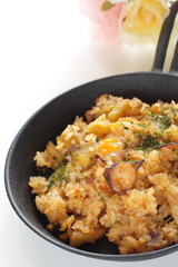 Korean food, spicy octopus fried rice in skillet pan