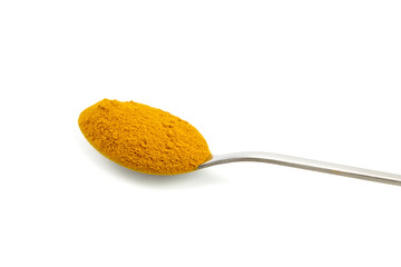Curcuma powder in spoon isolated on white background. Turmeric spice