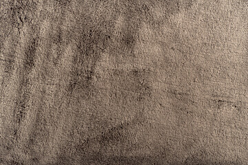 Abstract gray background. Velour, plush or suede. Rough texture.