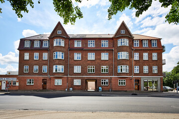 old brick building with small condos in denmark