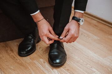 The groom is getting ready for the wedding