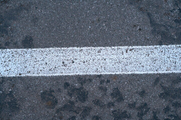 Fototapeta premium New asphalt with white stripe