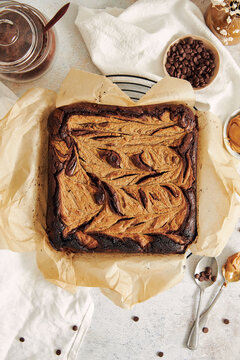 Vertical shot of delicious peanut butter swirl brownies