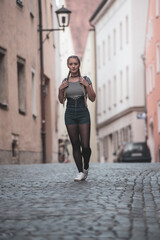 lovely girl with short trousers in the street