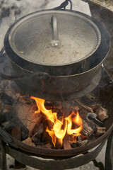 Old pot on an open fire