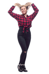 casual young woman in a red checked shirt and tight pants.