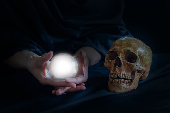 Fortune teller used crystal sphere and skull