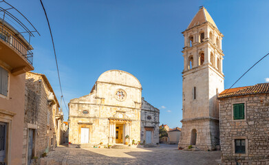 Obraz premium Marble stone architecture at city center with Saint Stephan Church in Stari Grad, Croatia