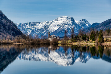 Fototapeta na wymiar Peaceful Lake Grundlsee With Alps In Styria in Austria, Springtime in Salzkammergut