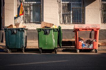 Dustbins full of trash. Selective trash collection in Russia became more wide spread
