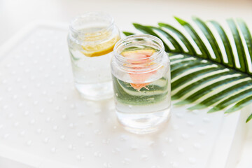 Hard seltzer with grapefruit and lemon. Homemade summer cocktails. Summer background,  copy space. Top view