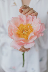 Sensual beautiful woman with pink peony in hands. Tender soft image. Spring aesthetics © sonyachny