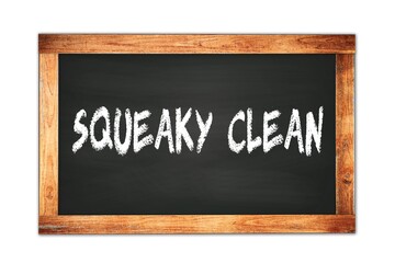 Fototapeta premium SQUEAKY CLEAN text written on wooden frame school blackboard.