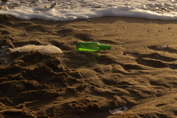 Glass bottle on the beach.