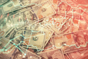Multi exposure of forex chart drawing over us dollars bill background. Concept of financial success markets.